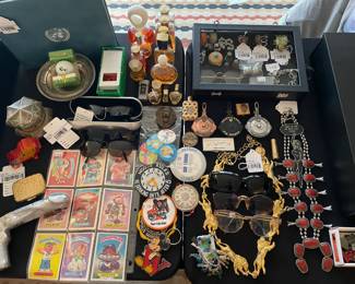 Lion Belt Chain, Sunglasses, Vtg. United Nations Stamp & Medal Book, Oakley Sunglasses, Perfume Bottles
