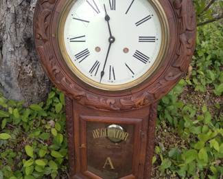 Carved regulator clock