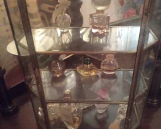 Glass showcase w high end fragrances