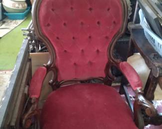 Great red victorian carved parlor arm chair