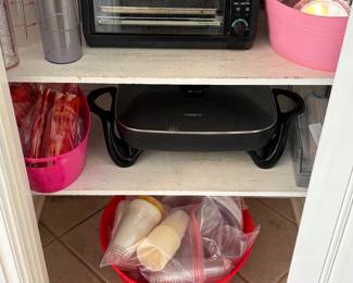 Small appliances toaster oven and like new frying pan