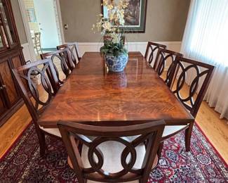 Dining table by Crescent includes table, 3 leaves, two arm chairs and si