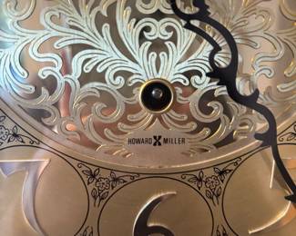 Details of face of Howard Miller Grandfather clock