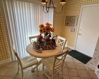 Pier 1 round dining table with four chairs