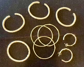 Bracelets and earrings John Hardy