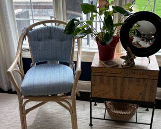 Rattan chair with pads and trunk table