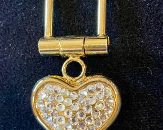 Nieman Marcus charm. Can be used on handbag or whatever you desire!