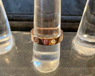 Cartier Rose Gold with stones (FAUX) but it's a good one!