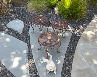 Concrete bunny and 3 little rusty stools