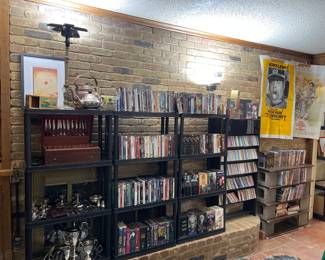 Huge Selection of DVDs, CDs, and even Some Posters