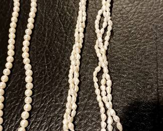 Strand of 72 pearl necklace on left. Also triple strand of smaller pearls. On right
All jewelry kept offsite. Must request at locked case. 1 customer at time