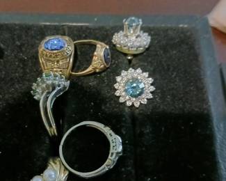 Gold rings. Pair diamond earring guards
With topaz. Jewelry will have to be requested from Paul at the locked case.