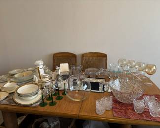 Pecan dining room table an six chairs. Beautiful china sets
