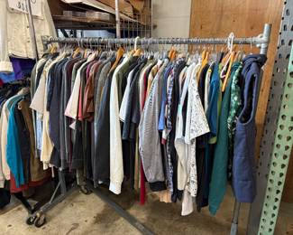 A full rack of more new with tags mens shirts 