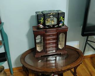 vintage table with glass top, jewelry boxes