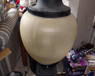 This is a plastic replica of a vintage lamp