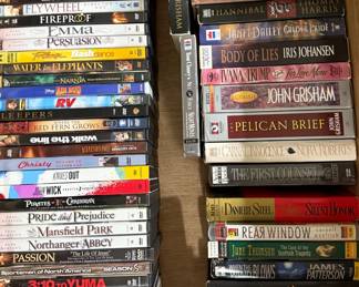 Assorted DVDs and books on tape