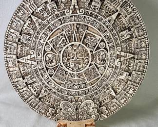 Stone Aztec calendar with carved stone base