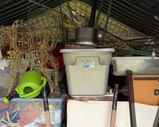 Light-up reindeer and bins of holiday items