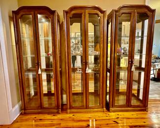 three glass shelf lighted cabinets available 