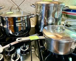 back right is a 10 qt Revere Ware stainless stock pot