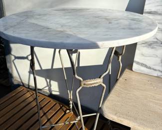 Antique twisted iron marble top ice cream shop table