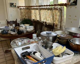 lots of kitchen stuff, nice steel pans, KitchenAid mixers, lots of dishes, small utensils, etc