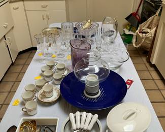 lots of kitchen stuff, nice steel pans, KitchenAid mixers, lots of dishes, small utensils, etc