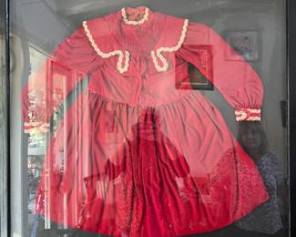 framed antique child's dresses, there are several