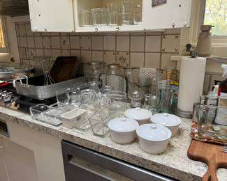 lots of kitchen stuff, nice steel pans, KitchenAid mixers, lots of dishes, small utensils, etc