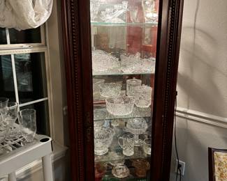 Crystal pieces, lighted cabinets