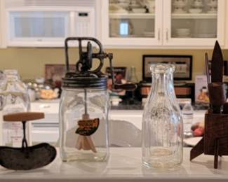 Daisy Butter churn and Assorted Glass Milk Bottles