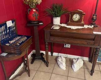 Old clocks , antique writing table… perfection! 