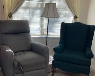 Grey chair rocks, reclines, heats, massages neck and lumbar!