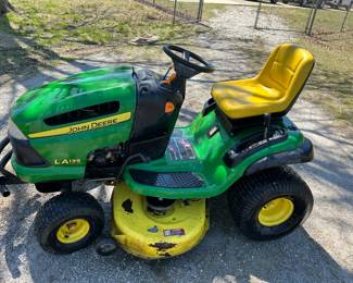 John Deere riding mower, runs and mows! 300 hours