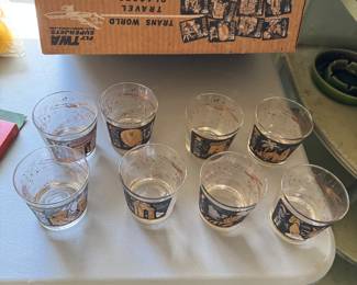 Set of vintage TWA travel rocks glasses. 8 different countries/cities represented that TWA flew to. Brand new in original box. Ireland. England. Italy. France. Greece. Portugal. California. New York. 
