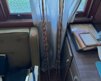 2 vintage wooden fishing poles 