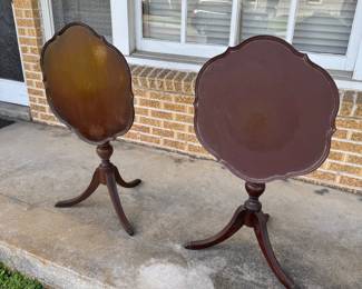 Pair of vintage mahogany tilt top 3 legged nightstands 