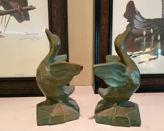 Vintage cast iron duck figurine door stop . We have two of these.