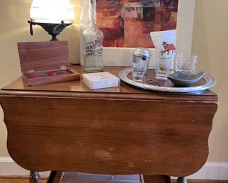 Drop leaf cart on casters with pull out tray