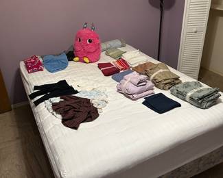 Fuzzy is also always up for relaxing on comfy beds