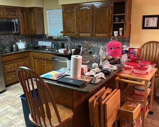 Fuzzy looking to make a snack, so many options to use to cook himself up something