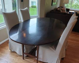 Oval dining table and four chairs