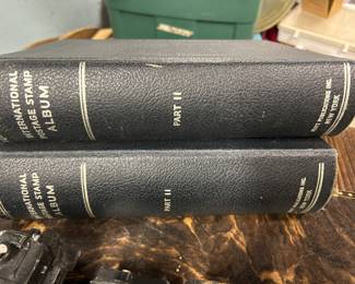 Stamp collecting books.
