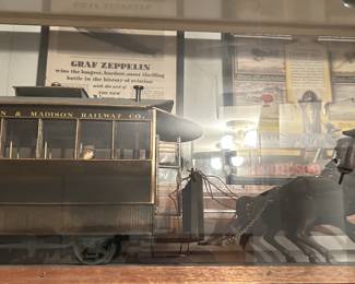 Trolly car under glass with horses … this one you must see. Don’t forget to bid .