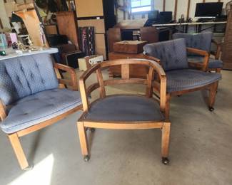 Rolling dining or game chairs.  Good bones ready for new cushions. 