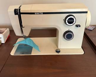 White sewing machine with cabinet
