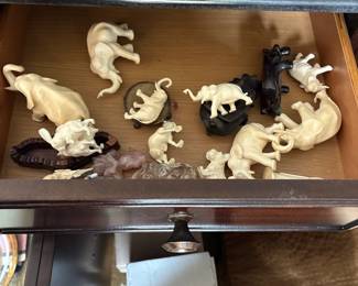 miniature carved ivory elephants