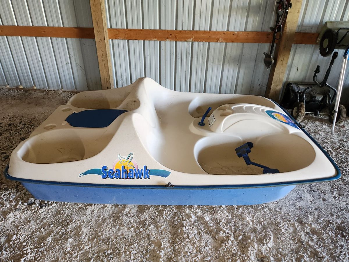 Seahawk V five passenger paddle boat with canopy by K.L. Industries