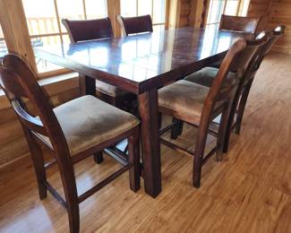 Gathering height dining table with 6 chairs and 1 leaf